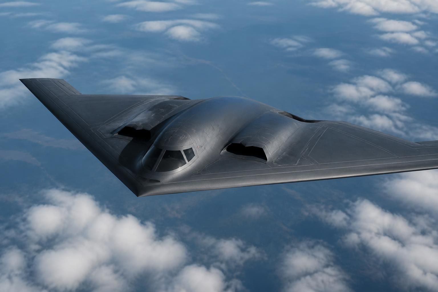 découvrez les caractéristiques et particularités de l'avion b-2 américain, un bombardier furtif de haute technologie utilisé pour des missions stratégiques.